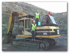 Collecting Terex TR100 radiator on site.
